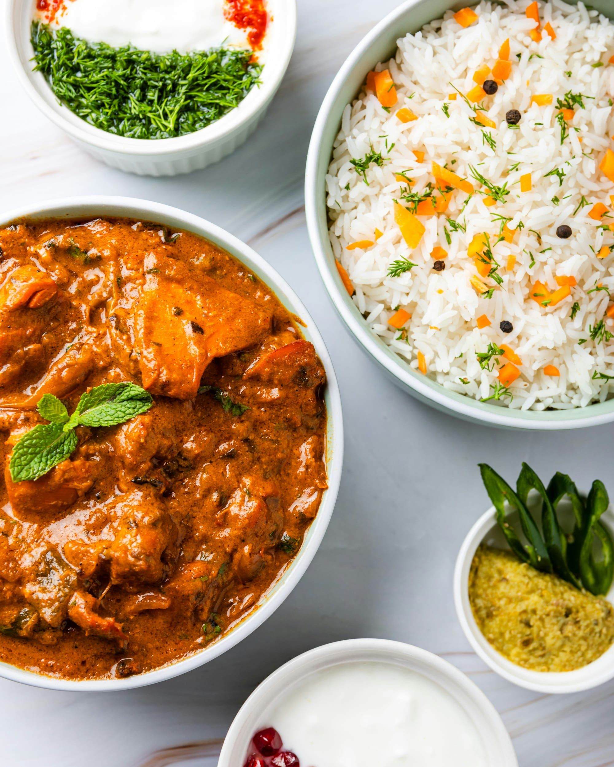 Prepared meals portioned into bowls